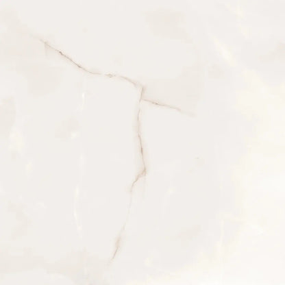 A close-up of a light warm off-white or cream surface with soft beige marbling and faint natural-looking veining.
