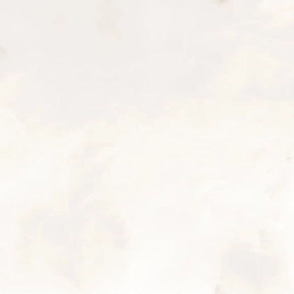 A close-up of a very light warm off-white surface with faint mottled beige and gray marbling or stone-like texture.